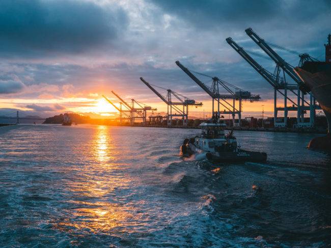 panoramic shot oil rigs sea with beautiful sunset 650x488 1